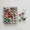 Hello Honey® 24 Pack 1" Round Hand-Painted Paper Mache Ball Ornaments